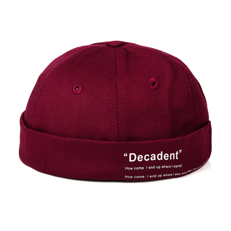 "Sleek Dome Rimless Melon Leather Hat: Contemporary Elegance for Every Occasion - Urban Caps
