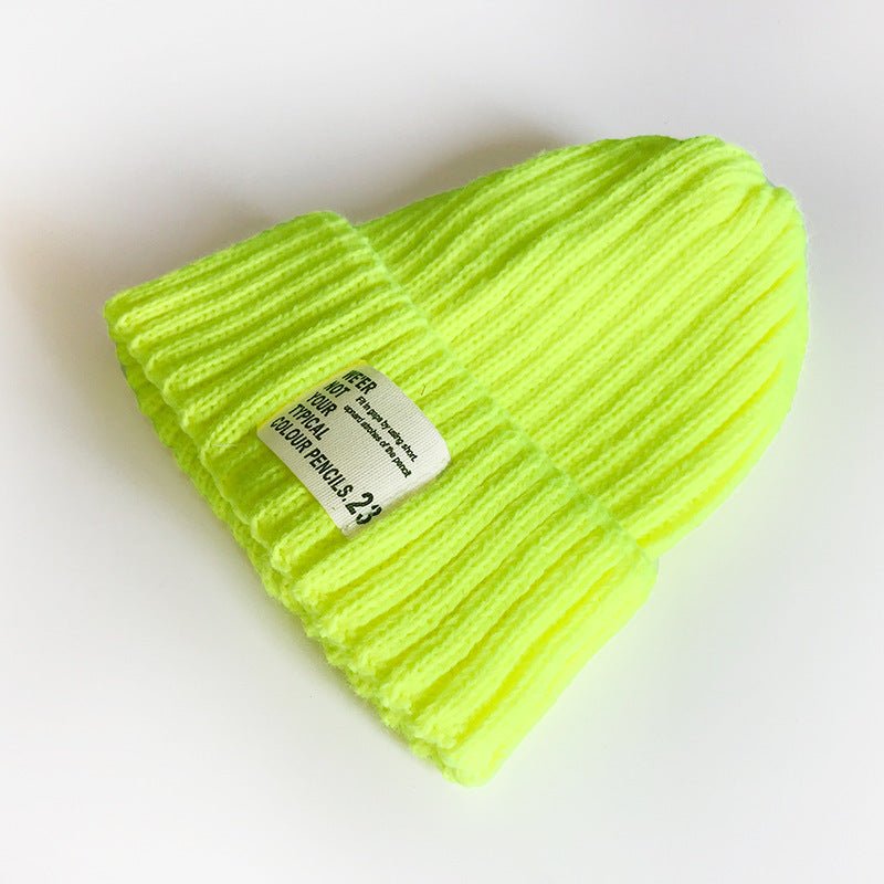 Street Style Label Beanie – Unisex Wool Knit Hat with Bold Tag Detail - Urban Caps