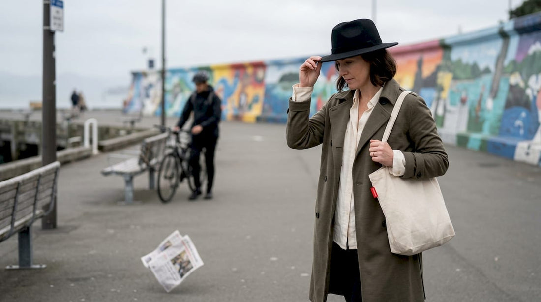 Woman wearing stylish fedora on Wellington promenade