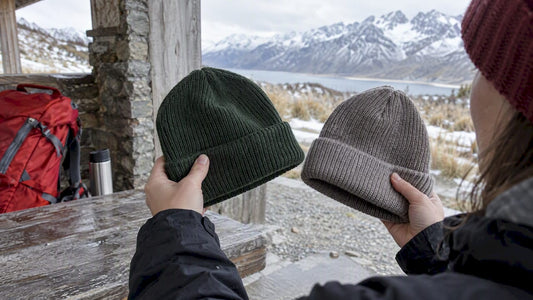 Two winter beanies compared for fabric texture