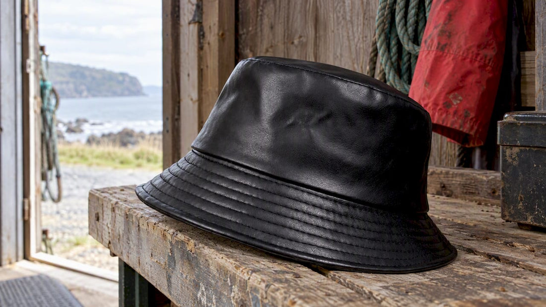 Full-grain leather bucket hat in a coastal shed