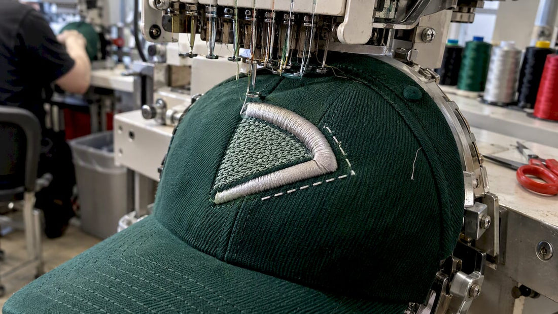 Cap showing satin, fill, and running stitches