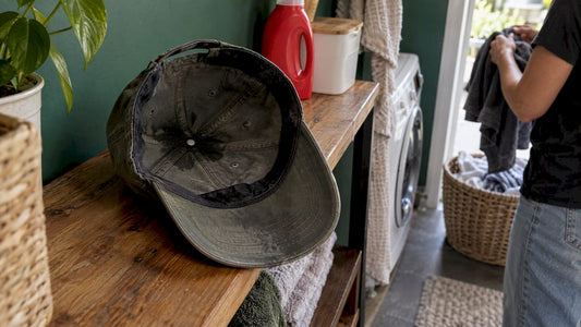 Damp cap resting in a humid laundry nook