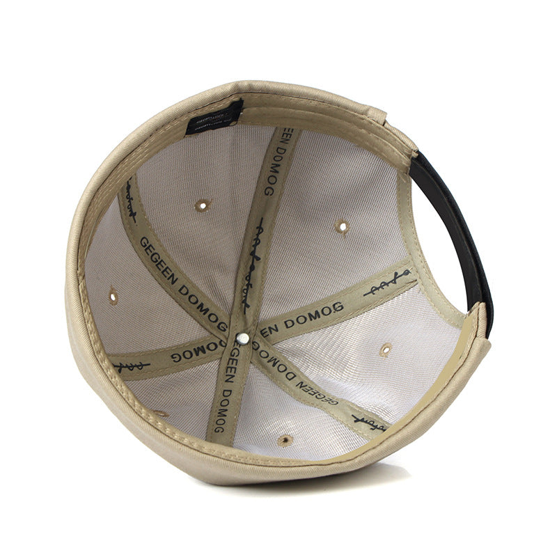 "Sleek Dome Rimless Melon Leather Hat: Contemporary Elegance for Every Occasion