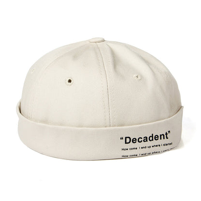 "Sleek Dome Rimless Melon Leather Hat: Contemporary Elegance for Every Occasion - Urban Caps 