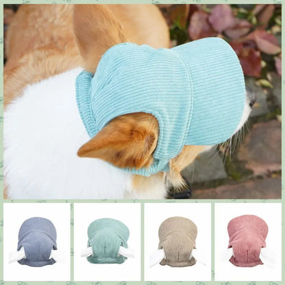 Small dog wearing a khaki corduroy cap
