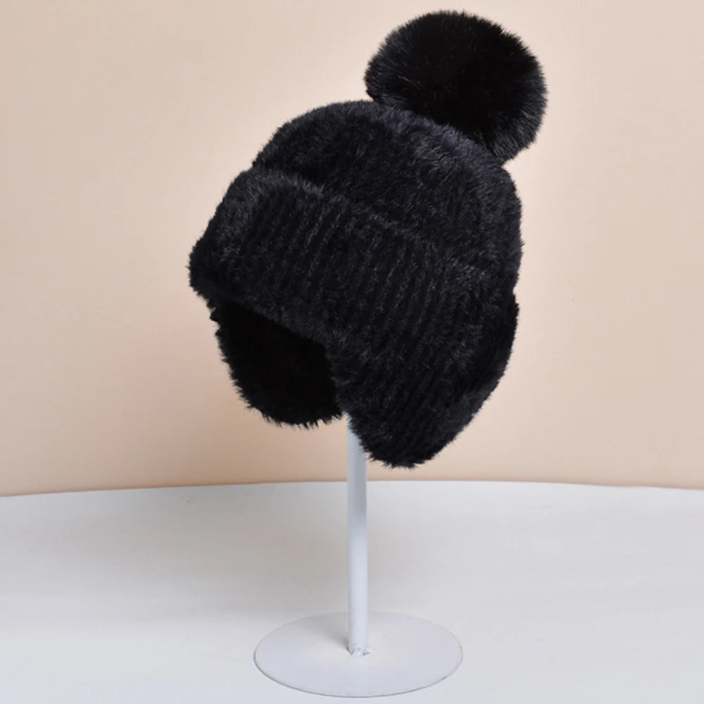 Tiksi Knitted Trapper Beanie in Black