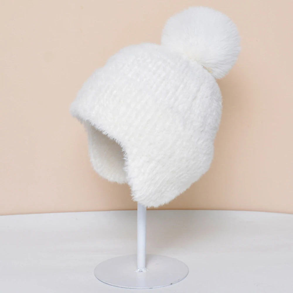 Tiksi Knitted Trapper Beanie in White