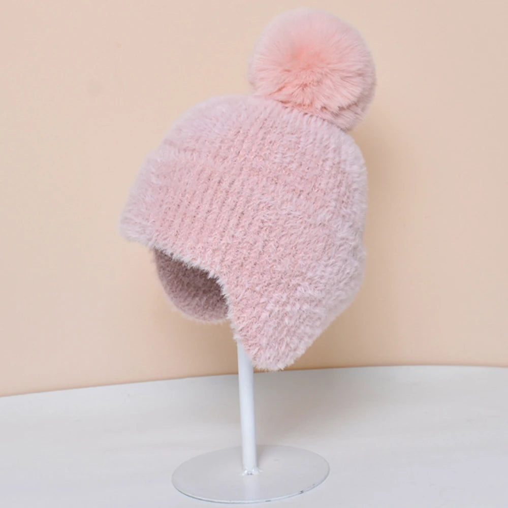 Tiksi Knitted Trapper Beanie in Pink