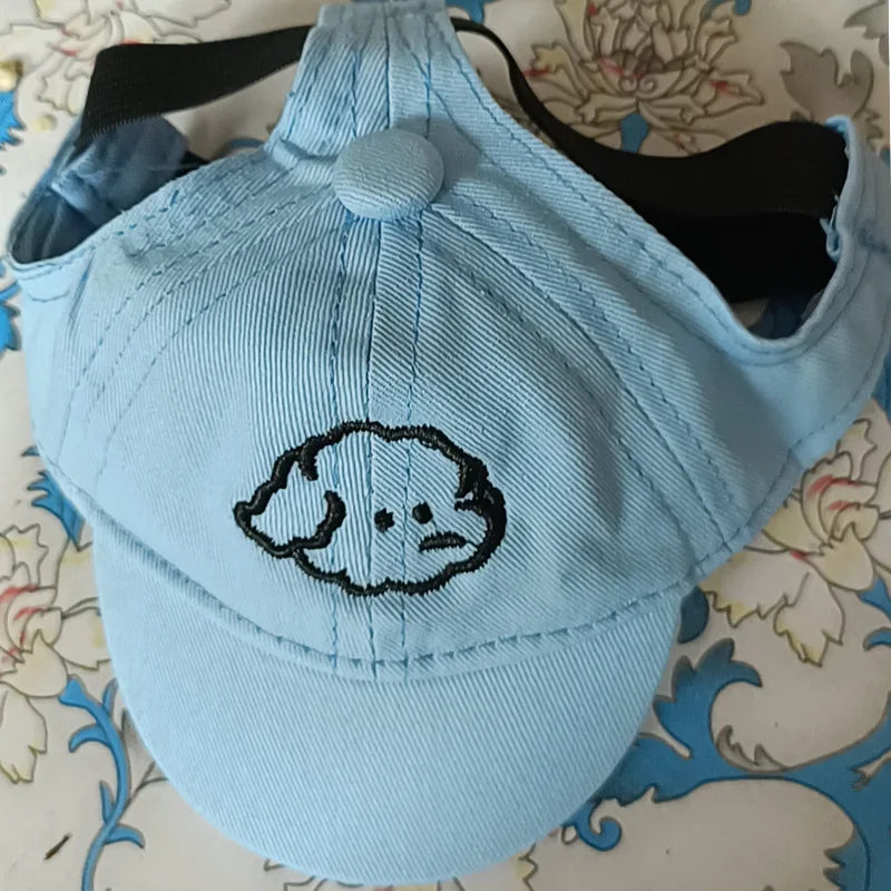 Twill dog cap with embroidered lettering in orange