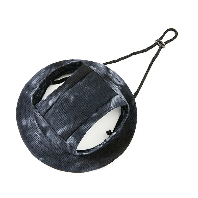 Dog bucket hat with ear holes and chin strap in pink