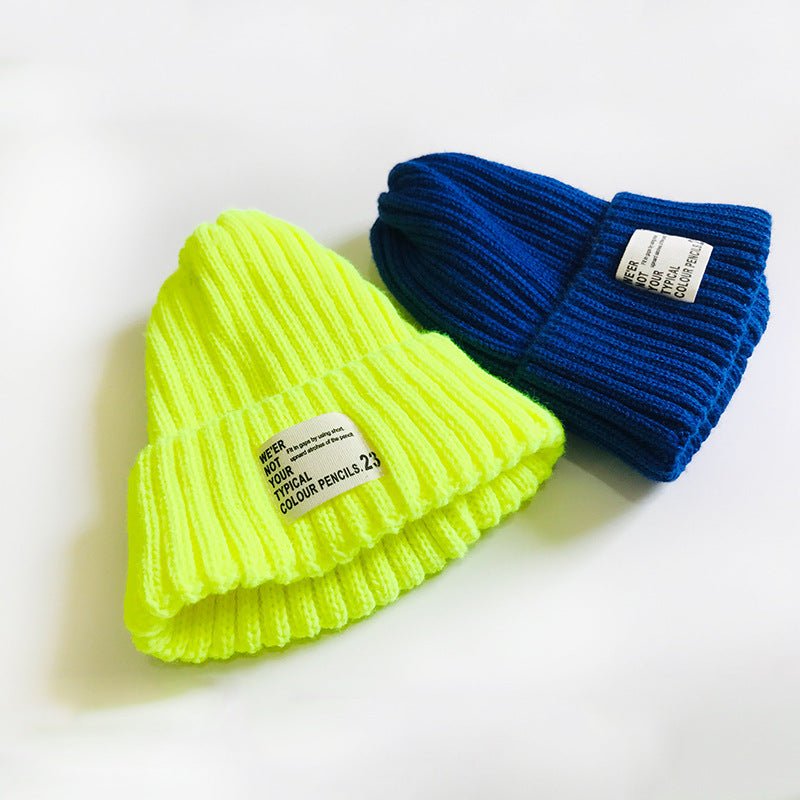 Street Style Label Beanie – Unisex Wool Knit Hat with Bold Tag Detail - Urban Caps