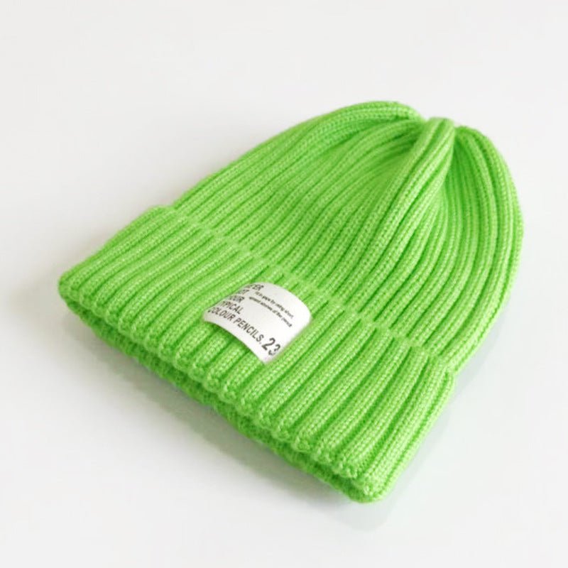 Street Style Label Beanie – Unisex Wool Knit Hat with Bold Tag Detail - Urban Caps