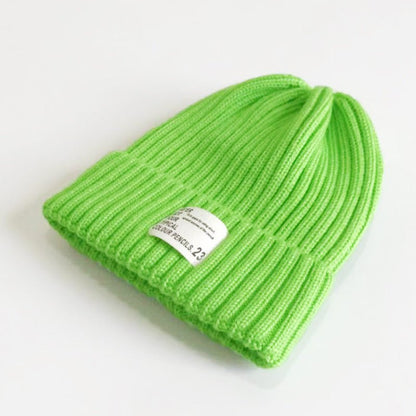 Street Style Label Beanie – Unisex Wool Knit Hat with Bold Tag Detail - Urban Caps